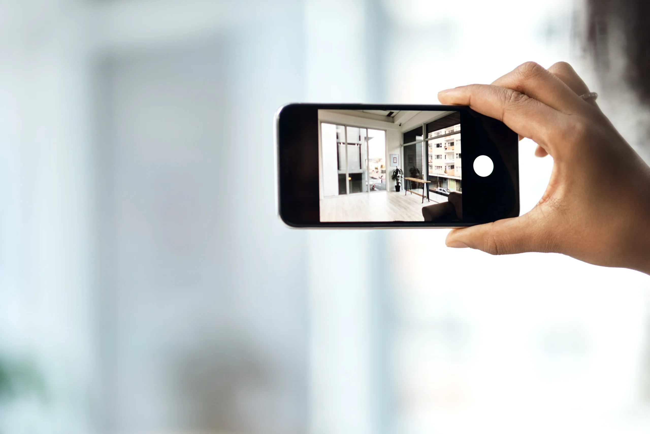 Alignment Drives Meaningful Performance, man capturing video of a property.